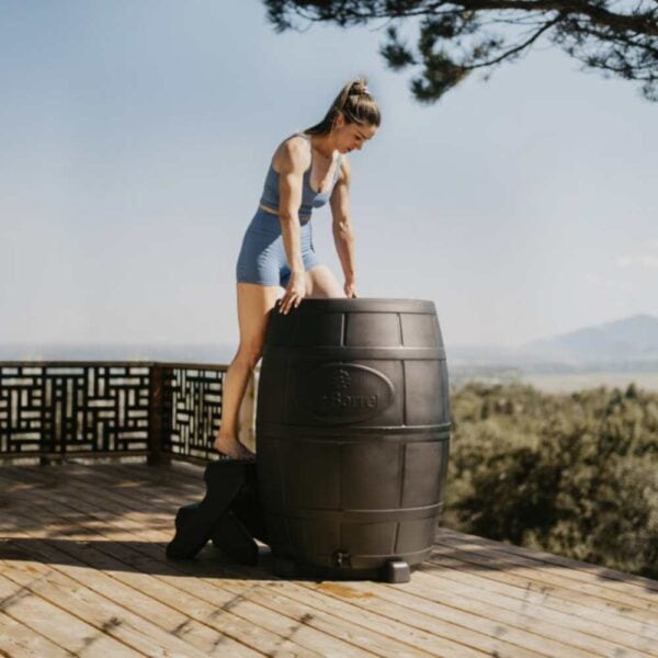 woman stepping into ice barrel 400