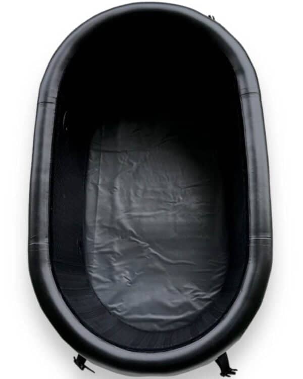 Inflatable black Kalm cold plunge tub inside