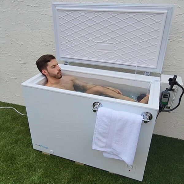 Man in freezer cold plunge box 10