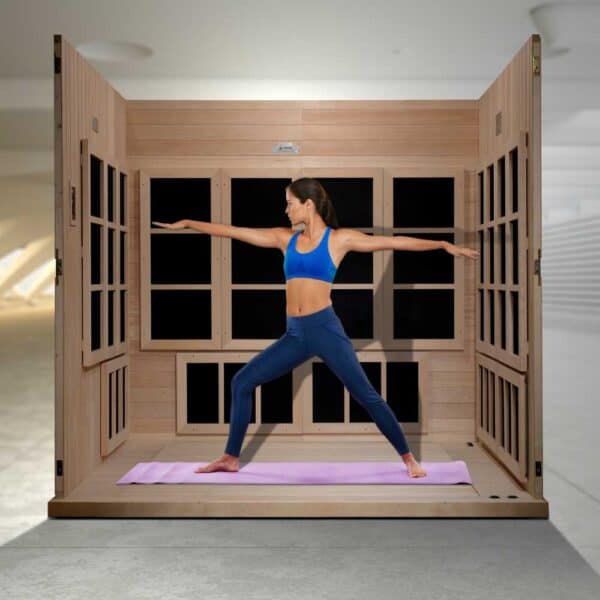 woman doing yoga in the Golden Designs Catalonia 8-person PureTech™ Near Zero EMF FAR Infrared Sauna